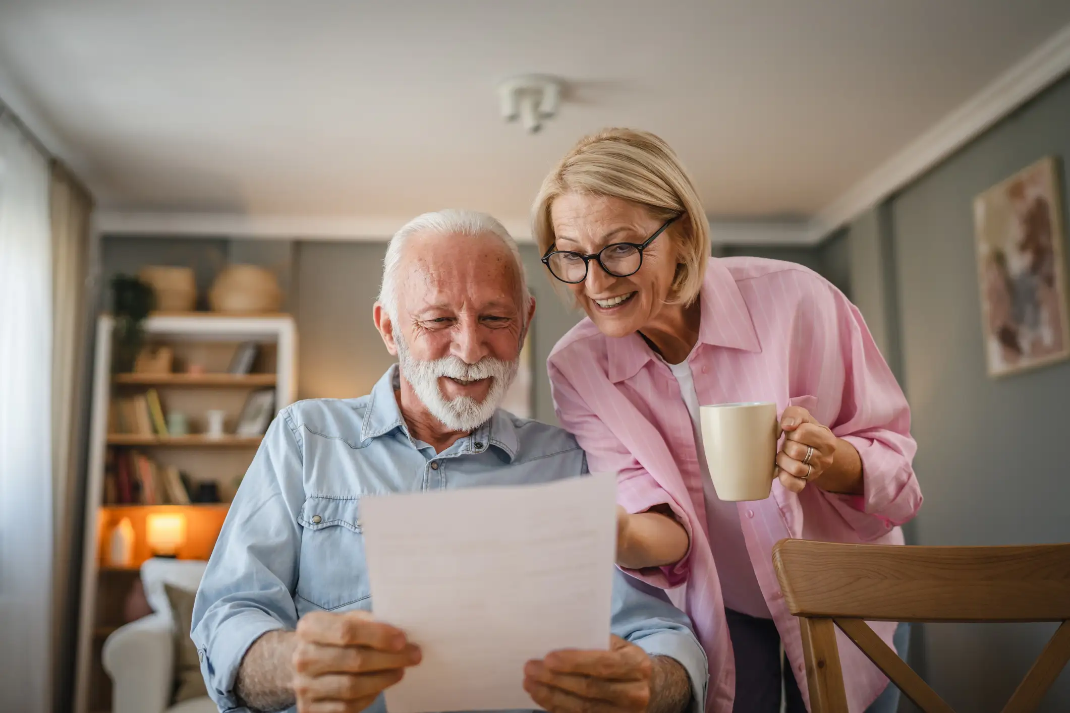 Senior couple reviewing a document together
